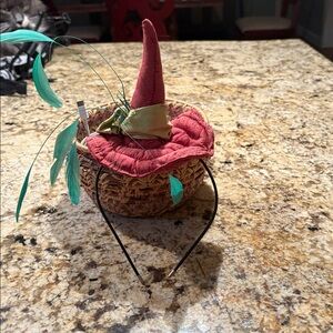 Red and Green Woven Basket with Feathers